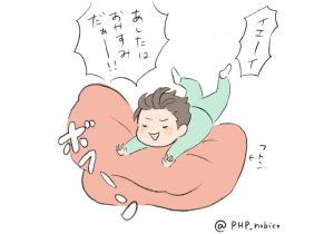 布団に飛び込む３歳児